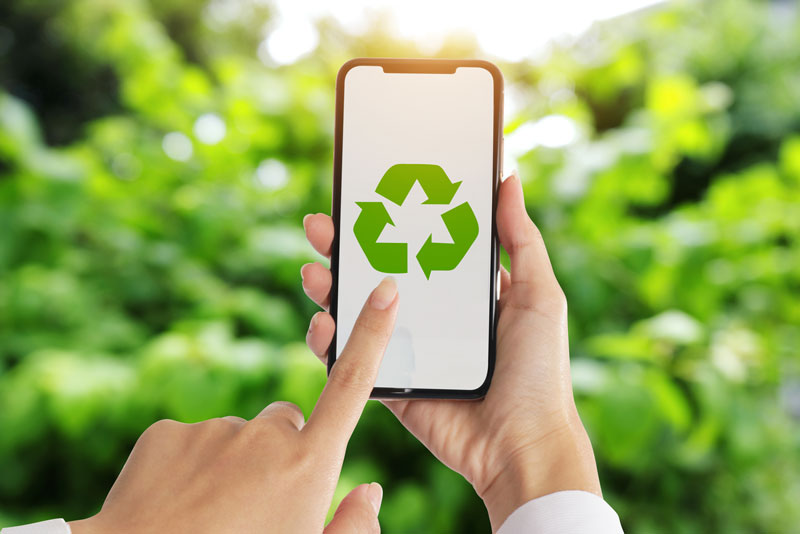 image of a phone with a recycling icon on it